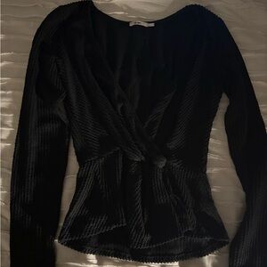 Black v-neck shirt with a knot